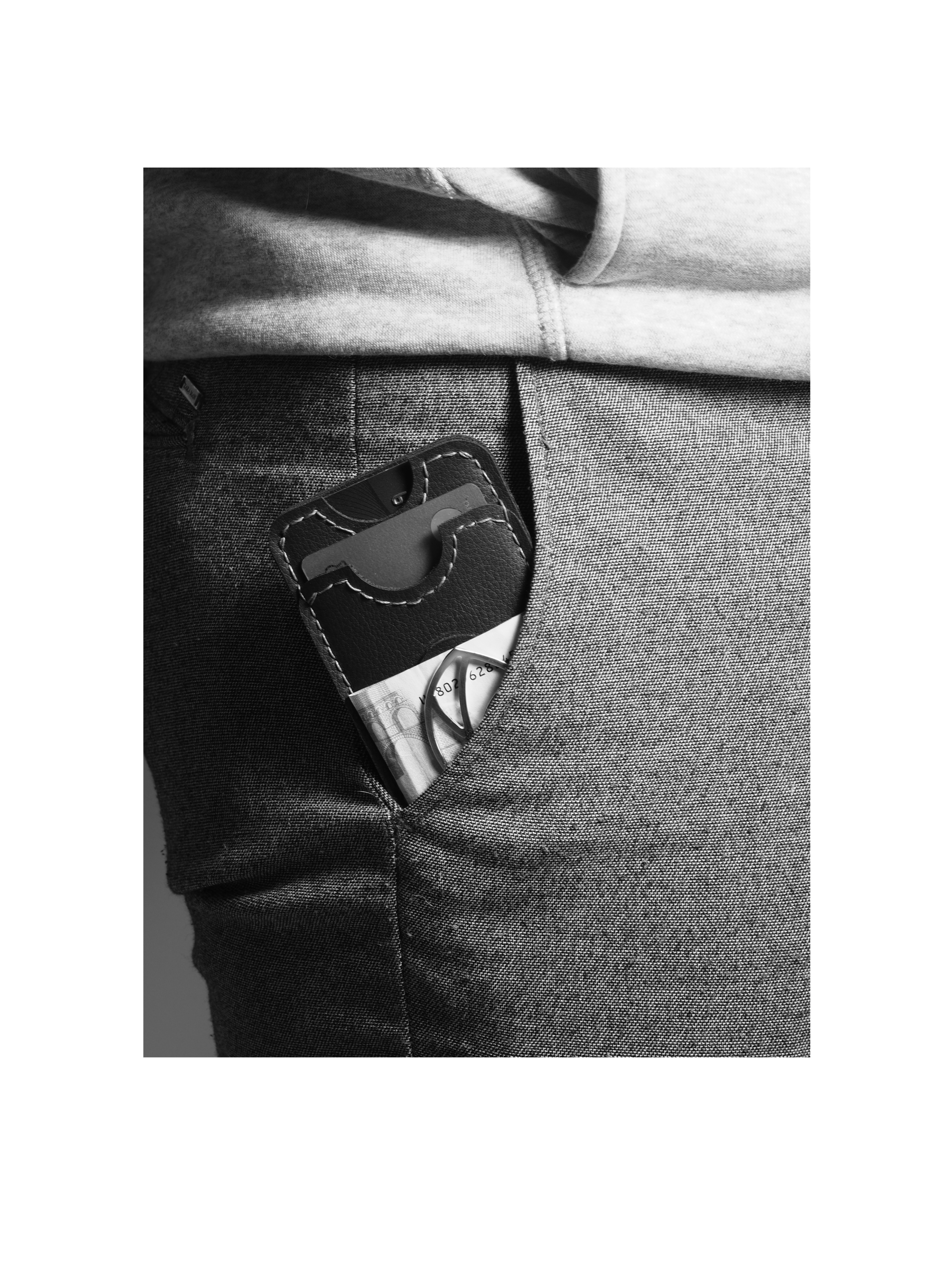 Cardholder made from blue vegan leather includes a money clip made of silver that fits perfectly in the pocket.